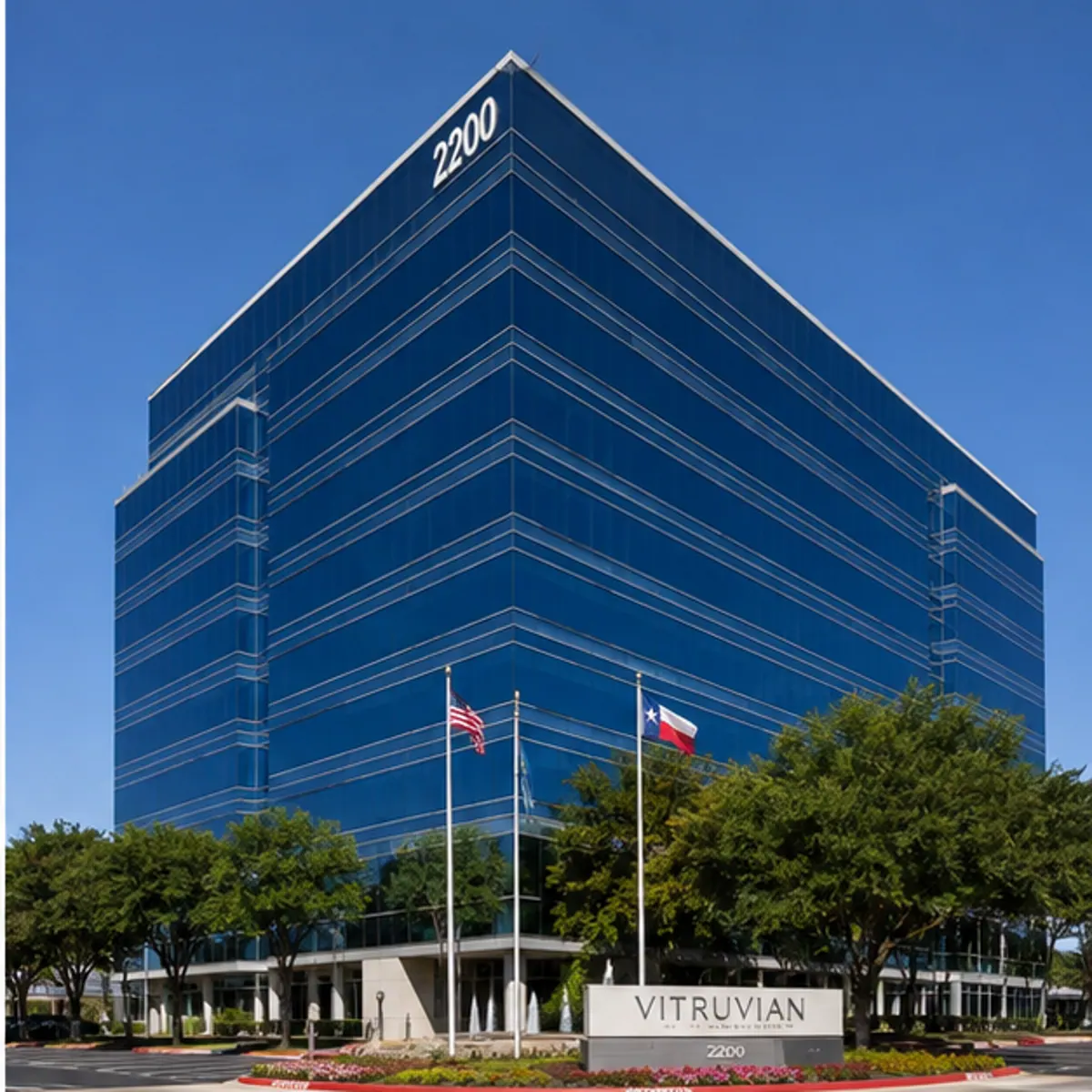 A blue glass office tower at Vitruvian Park in Addison, Texas